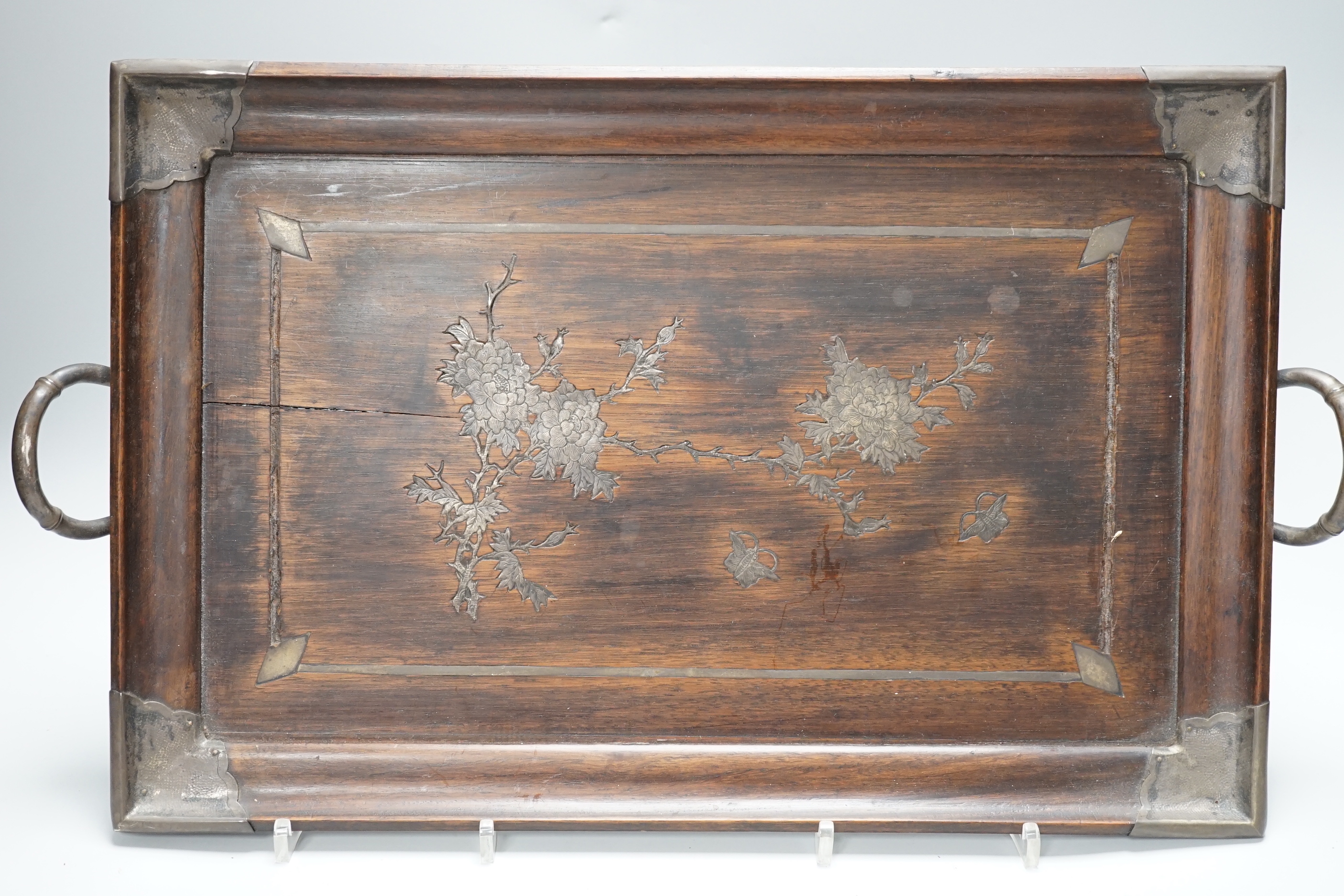 A Chinese white metal wall mounted hongmu tray and a Chinese carved soapstone table screen on stand, tray 44cm x 29.5cm